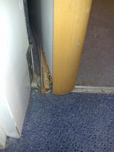 DAMAGED DOOR